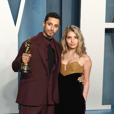 Riz Ahmed and Fatima Farheen Mirza took a picture with an Oscars Award in Riz's hand.
